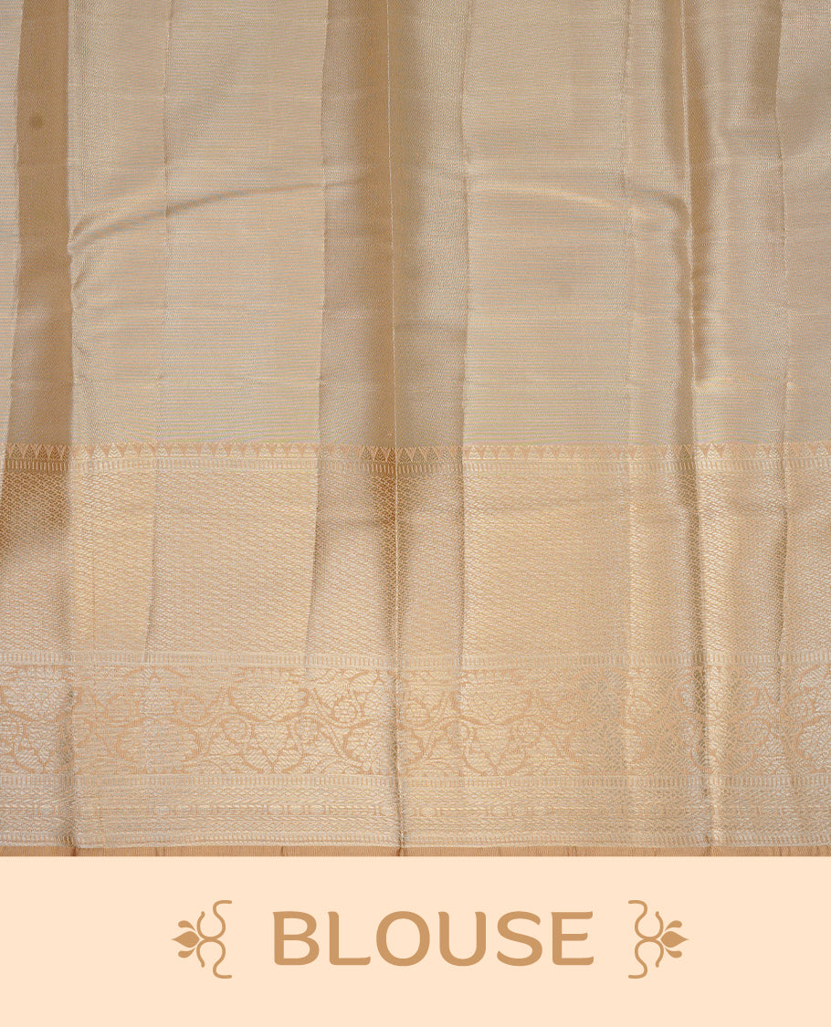 Light Gold colour semi tissue silk saree featuring silver zari pattern on body, contrast gold colour with gold zari traditional border, paired with matching blouse piece.