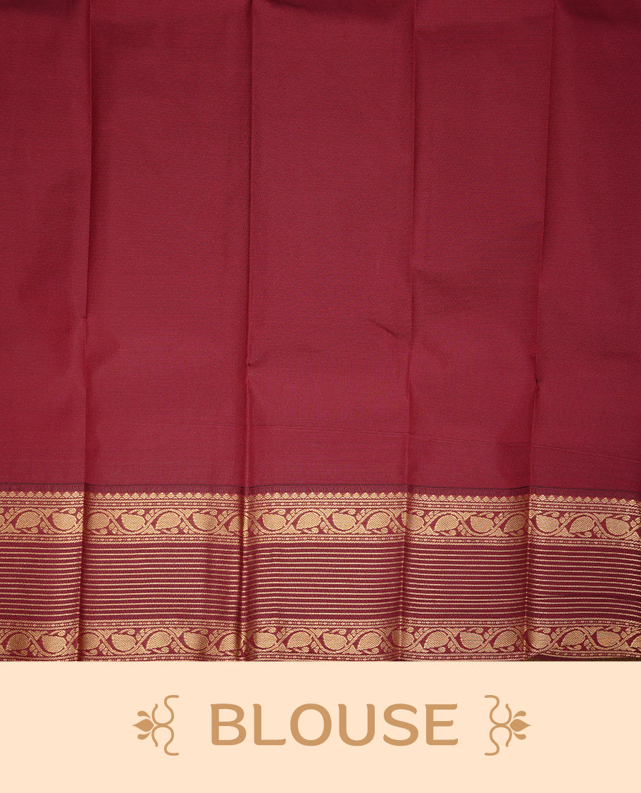 Lemon coloured soft silk saree featuring gold zari stripes and motifs across the body, enhanced with a contrast Maroon border and pallu, paired with a matching contrast blouse piece.