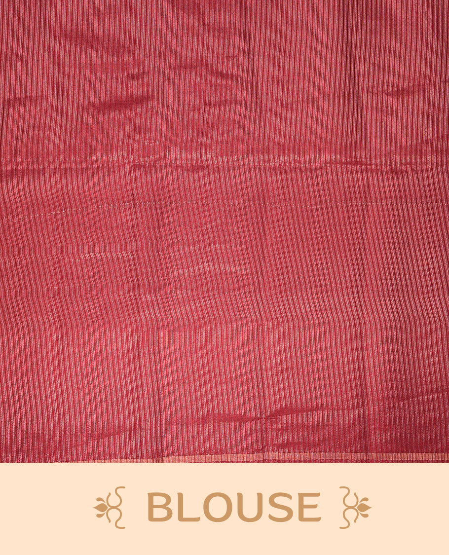 Pinkish Maroon colour semi tussar silk saree highlights gold and silver zari stripes across body,  border, pallu and paired with matching blouse piece.