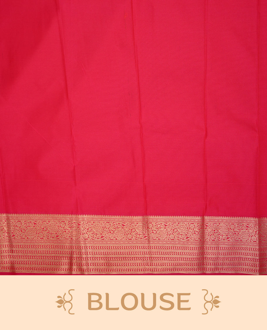 Green coloured soft silk saree featuring gold zari stripes and motifs across the body, enhanced with a Self colour border and pallu, paired with a matching contrast blouse piece.