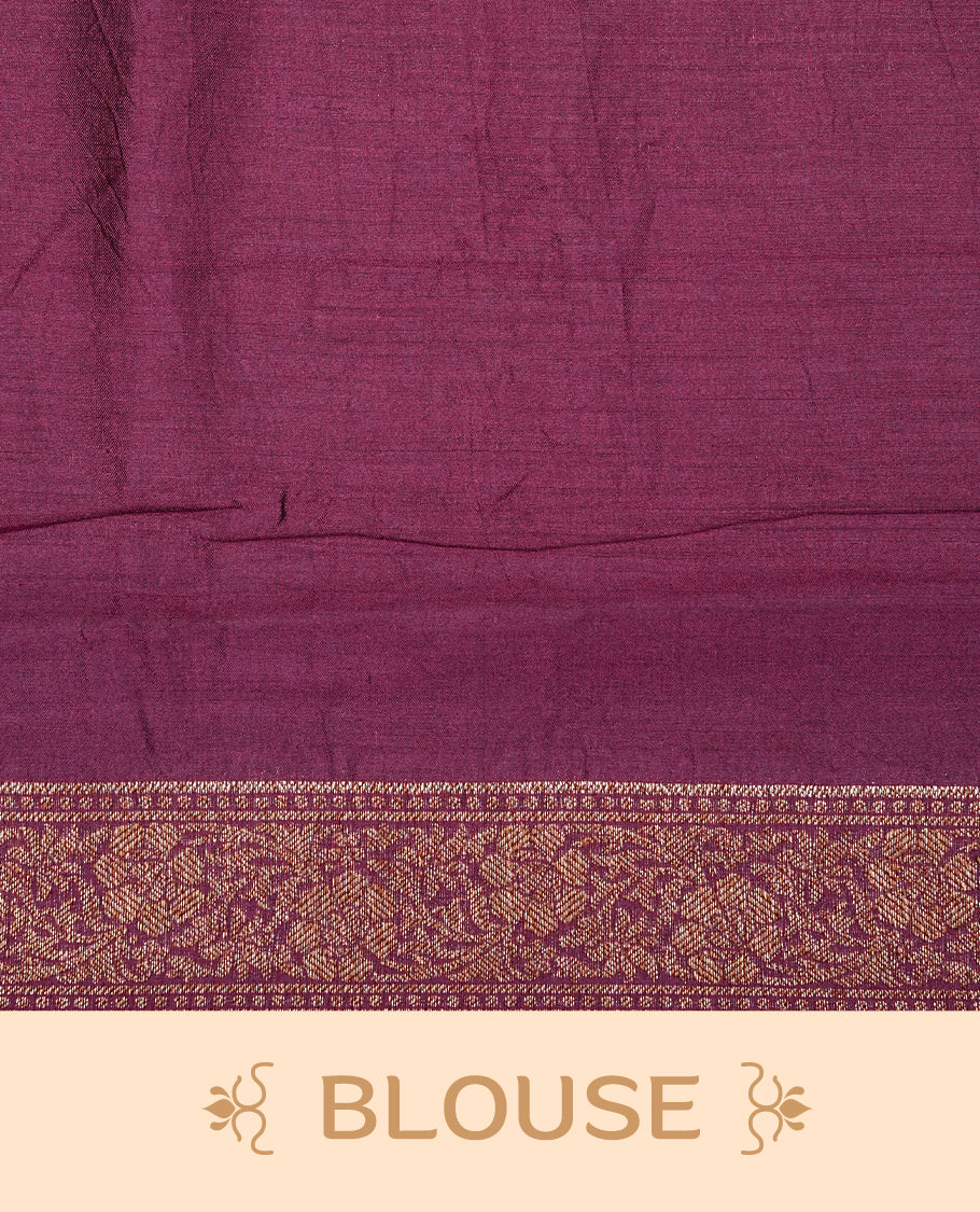 Radiant orange Colour Tussar silk saree with antique zari buttas On Body, a rich Wine floral zari border, an elegant floral zari pallu, Paired With a matching blouse piece.