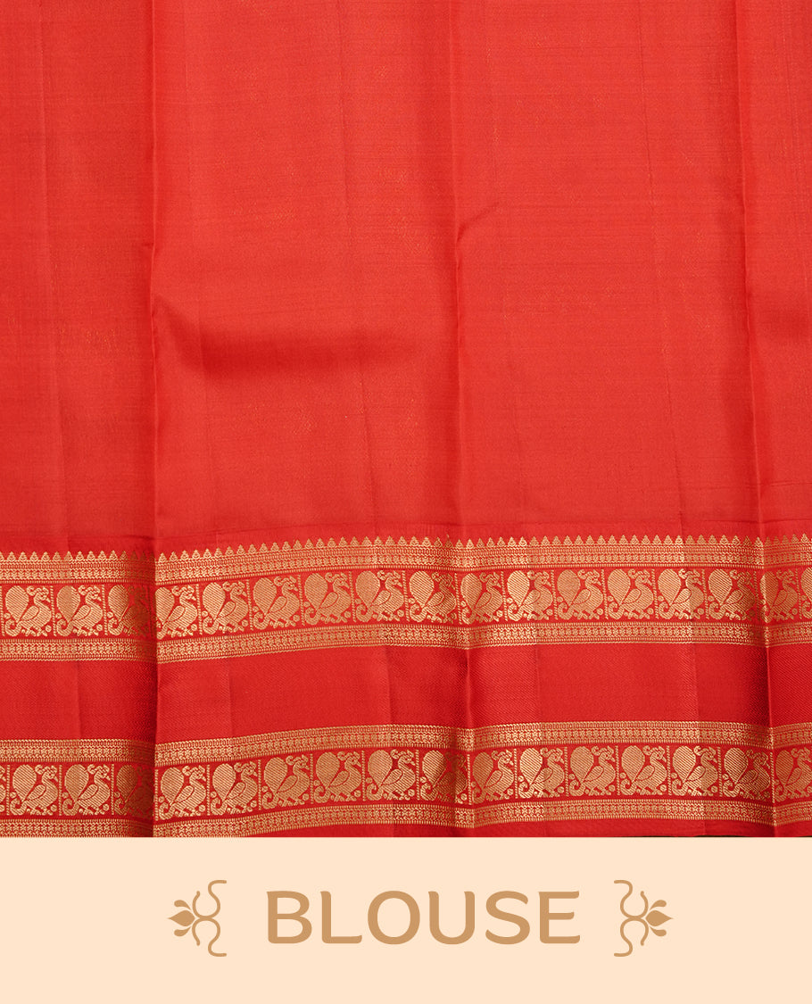 Navy blue colour traditional kancheepuram silk saree featuring gold zari strpies on body, complemented by contrast red colour with gold zari traditional border, paired with matching blouse piece.