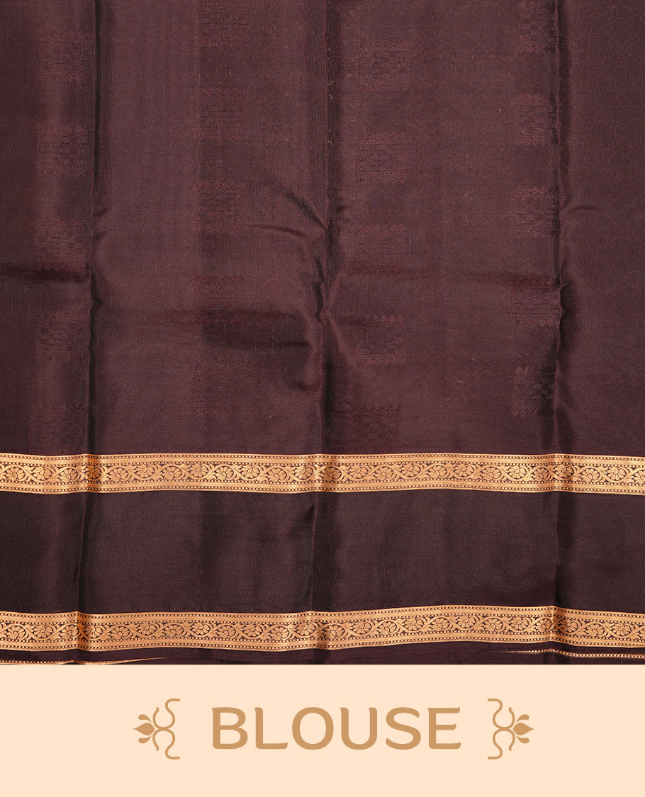 Green colour traditional kancheepuram silk saree featuring gold zari stripes & motifs on body, complemeneted by contrast chocolate colour with traditional border, paired with matching blouse piece.