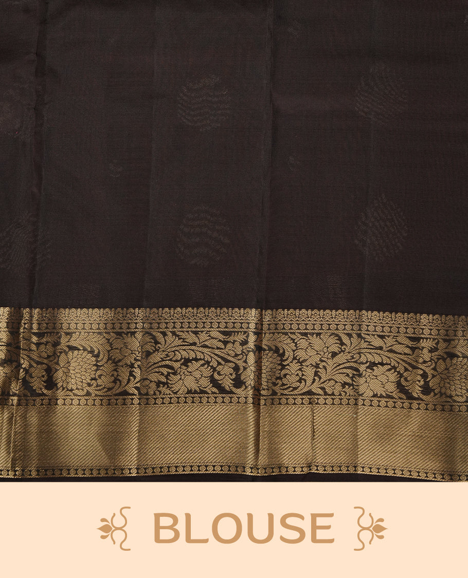 Mustard colour soft silk saree featuring gold zari motifs on the body, complemented by a contrast chocolate brown traditional zari border and pallu, paired with a matching blouse piece.