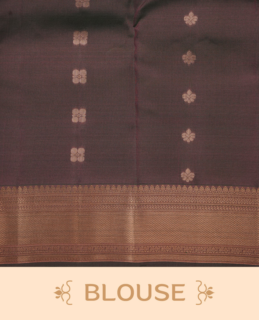 Mauve colour soft silk saree featuring gold zari motifs on the body, complemented by a contrast Green traditional zari border and pallu, paired with matching blouse piece.