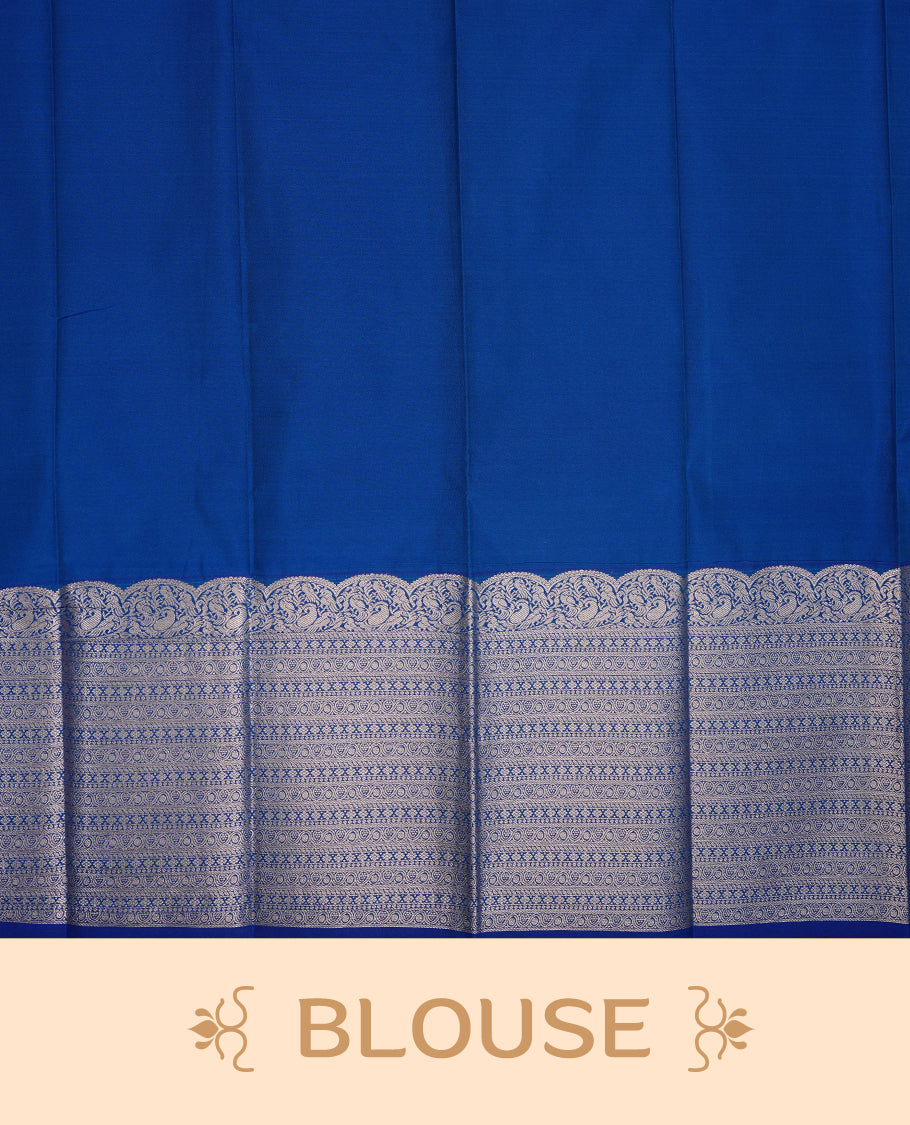 Blue coloured soft silk saree featuring Rose gold zari stripes and motifs across the body, enhanced with a Self colour with traditional border and pallu, paired with a matching blouse piece