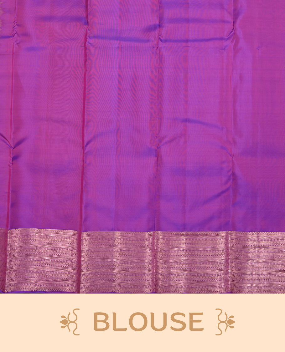 Indigo colour Vasundhara silk saree adorned with all-over gold motifs on the body, complemented by a self colour with gold tarditional border and paired with a matching blouse piece.