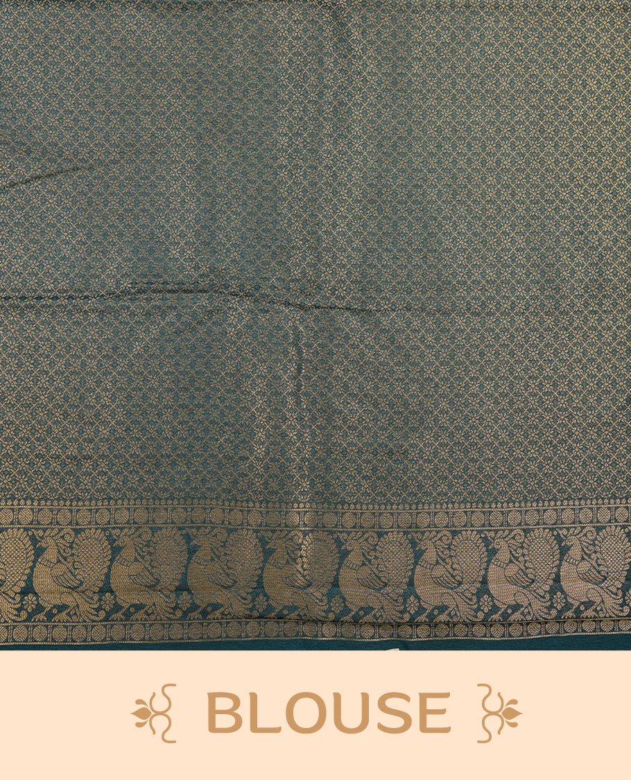 Teal colour semi soft silk saree featuring gold zari motifs on across body, self colour border with traditional gold zari pattern, pallu and paired with matching blouse.