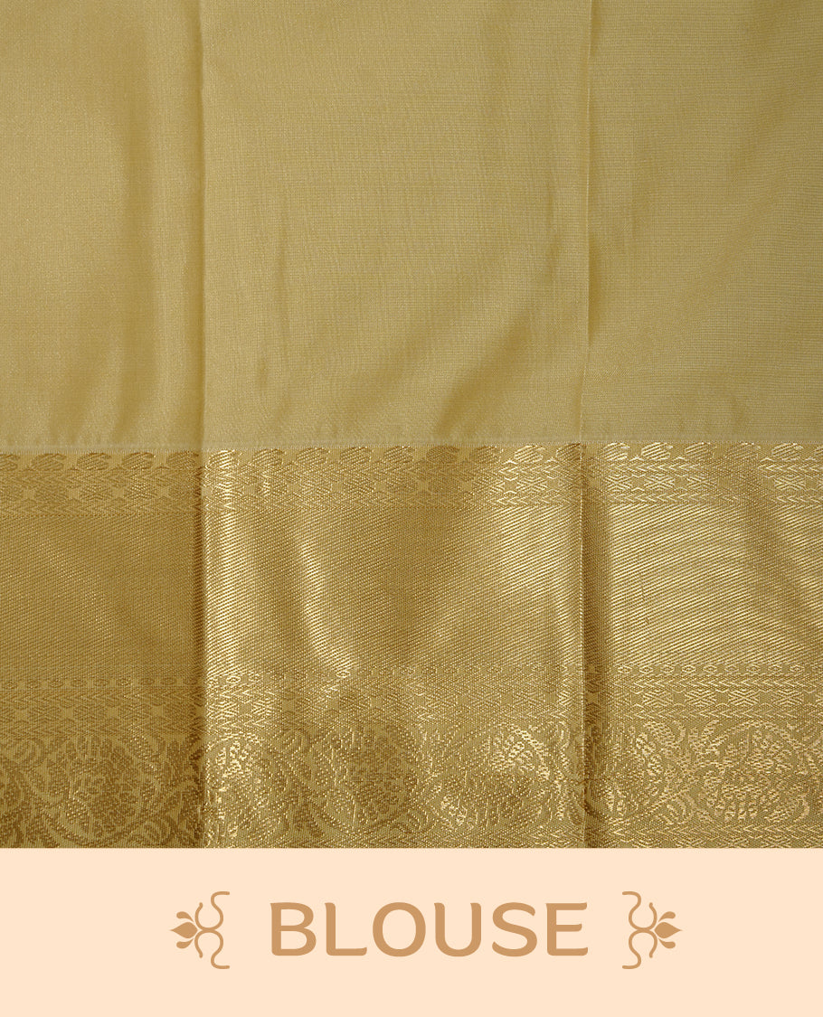 Orange coloured soft silk saree featuring gold zari stripes and motifs across the body, enhanced with a contrast Cream border and pallu, paired with a matching contrast blouse piece.