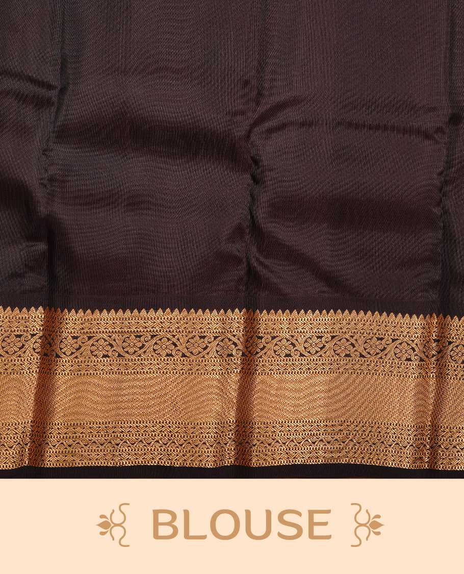 Mustard colour traditional kancheepuram silk saree featuring gold zari motifs on body, complemented by contrast black colour with gold zari traditional border, paired with matching blouse piece.
