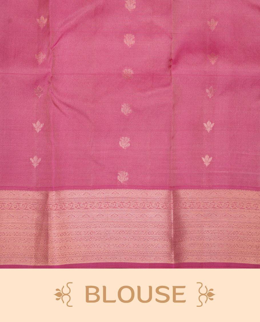 Sandalwood colour soft silk saree featuring gold zari motifs on the body, complemented by a contrast Magenta traditional zari border and pallu, paired with a matching blouse piece.