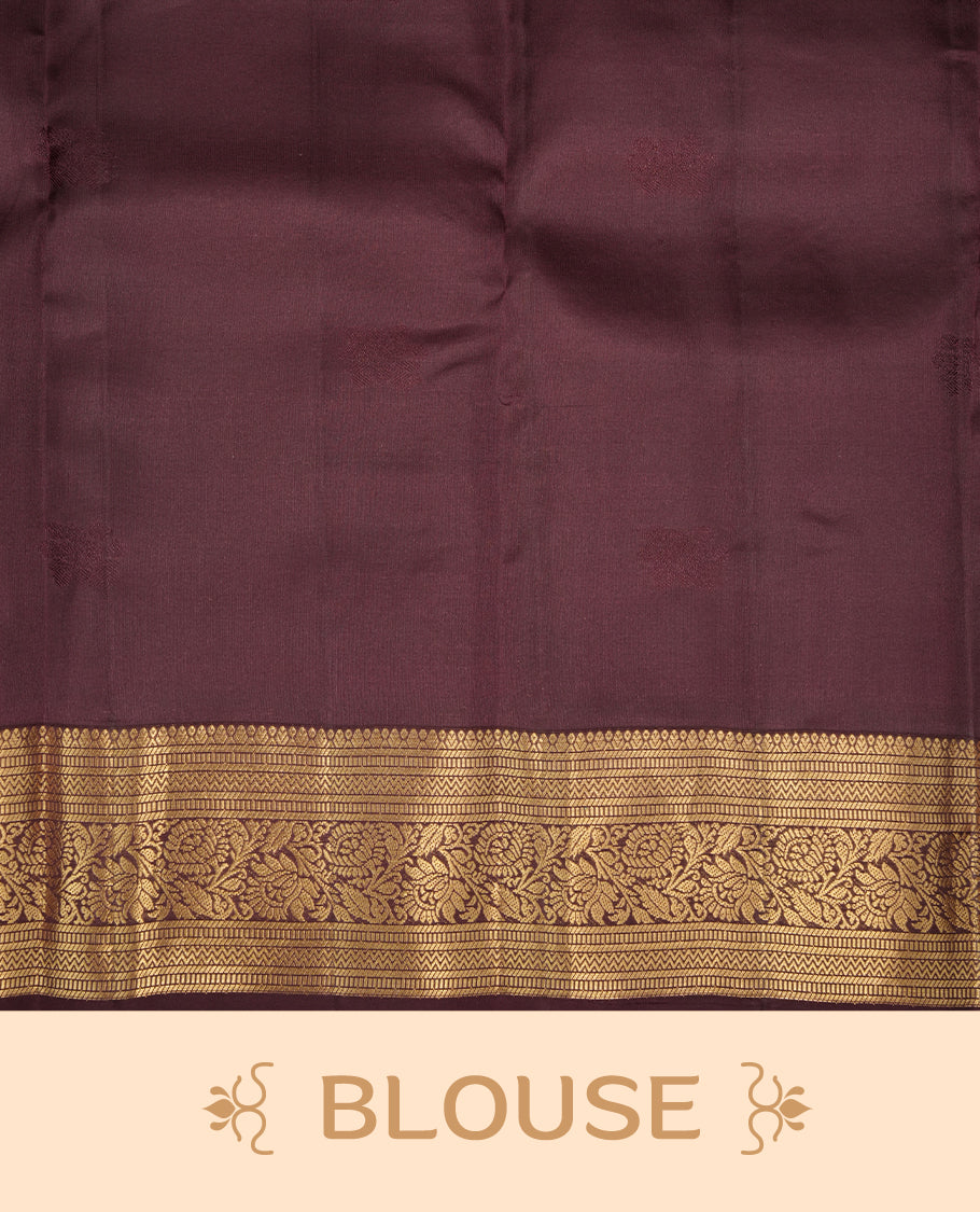 Rust colour soft silk saree featuring gold zari motifs on the body, complemented by a contrast Chocolate traditional zari floral kodi border and pallu, paired with a matching blouse piece.