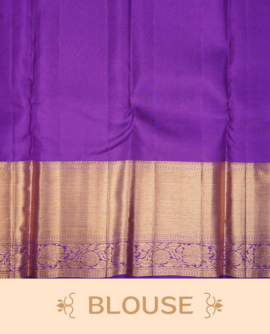 Indigo colour kancheepuram silk saree featuring gold zari pattern across body, complemented by selfcolour border traditional zari border, paired with matching blouse piece.
