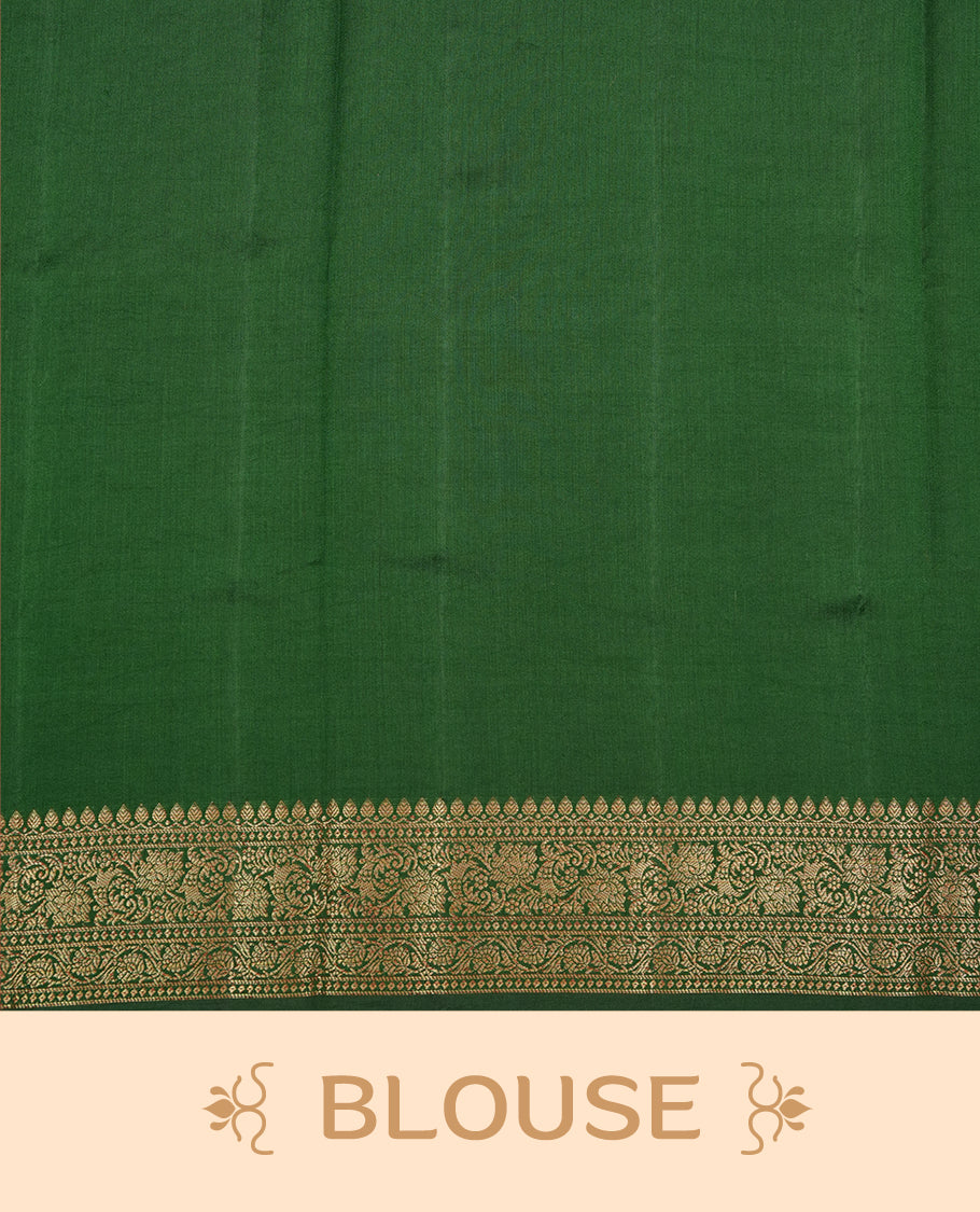 Green colour Pure banaras soft silk saree featuring Antique zari motifs on body, contrast Dark green colour border , traditional pallu and paired with matching blouse