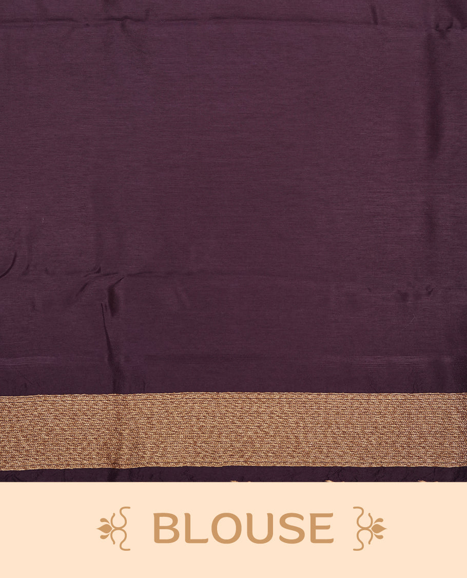 Grape colour semi banaras tussar georgette saree featuring antique gold zari buttas on body, temple pattern on border and floral pattern on pallu, paired with matching blouse piece.