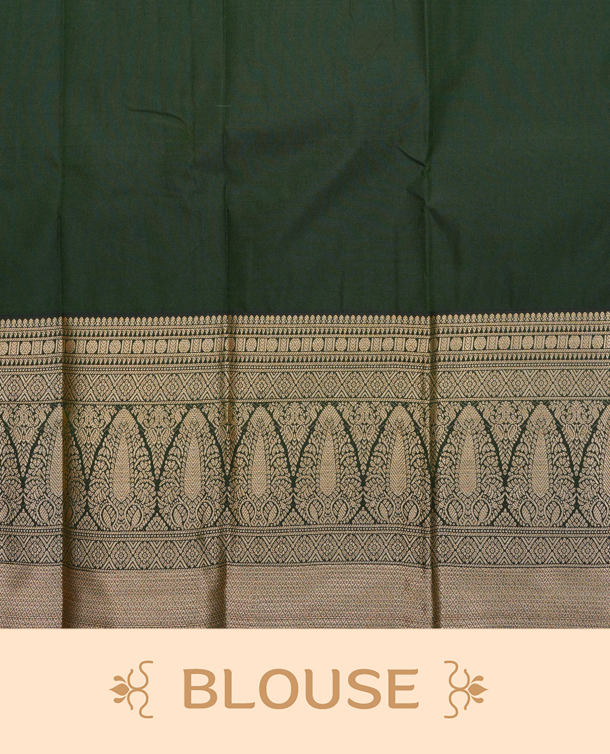 Dark green colour soft silk saree featuring gold zari buttas on body, contrast self colour gold zari traditonal border, grand pallu comes with matching blouse piece.