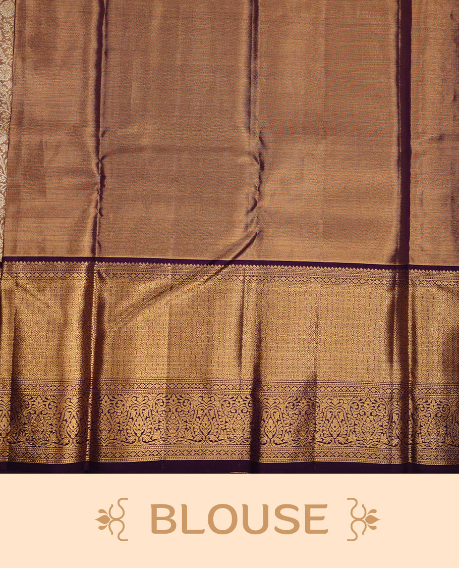 Gold colour kancheepuram tissue silk saree featuring gold zari pattern across body, complemented by contrast purple colour border traditional zari border, paired with matching blouse piece.