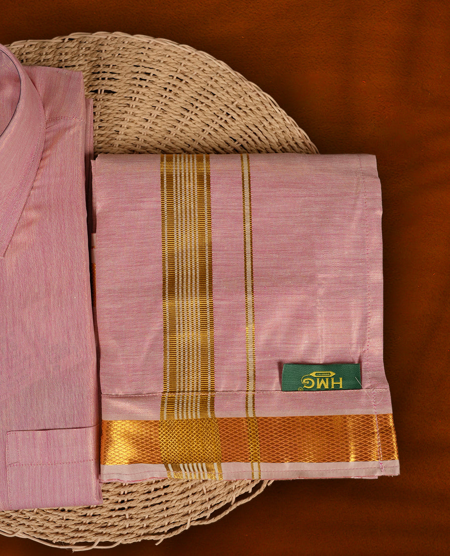 Elegant pastel pink shirt & dhoti set by HMG, adorned with rich gold zari borders & Perfect for weddings, festive occasions & gifting.
