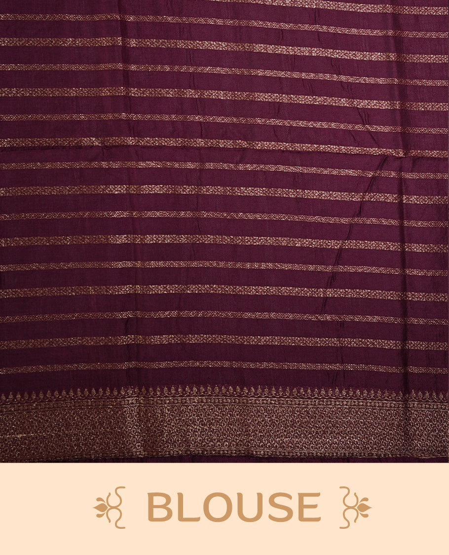 Grape colour semi Banarasi Tussar Georgette saree with delicate gold zari buttas on the body, a rich golden zari pallu, and detailed woven border & Comes with a matching blouse piece.