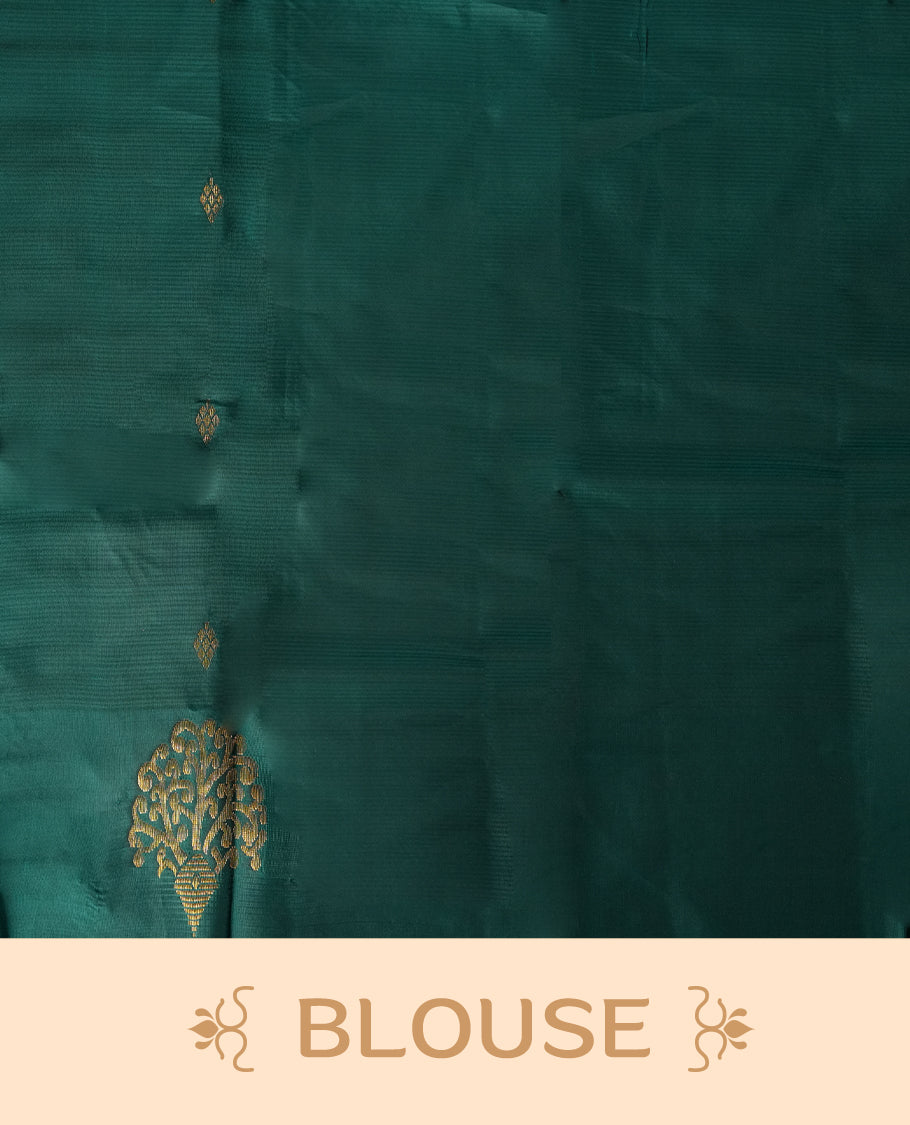 Coffee brown colour soft silk saree adorned with intricate golden zari motifs, teal green colour border for a perfect blend of tradition & Paired with a matching blouse.