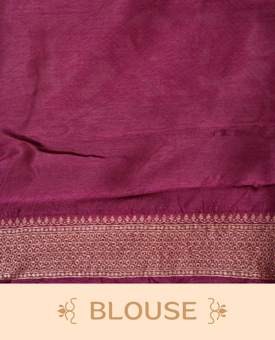 Deep Mauve colour Semi Banaras Tussar Georgette Featuring Gold zari Leaf pattern on body, Finished with Gold zari border and paired with matching blouse piece.