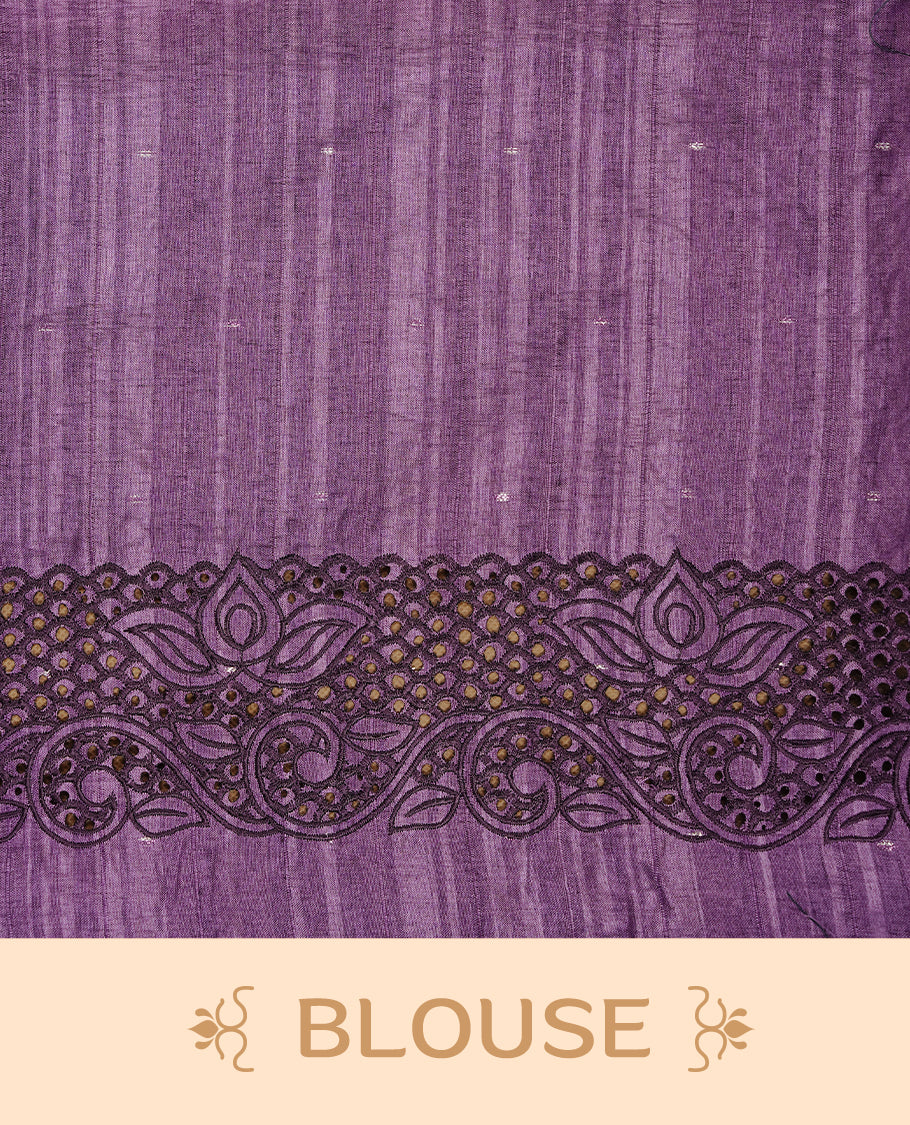 Purple colour Semi Tussar silk saree features an intricate cutwork embroidered peacock motifs on border, paired with a matching unstitched blouse piece.