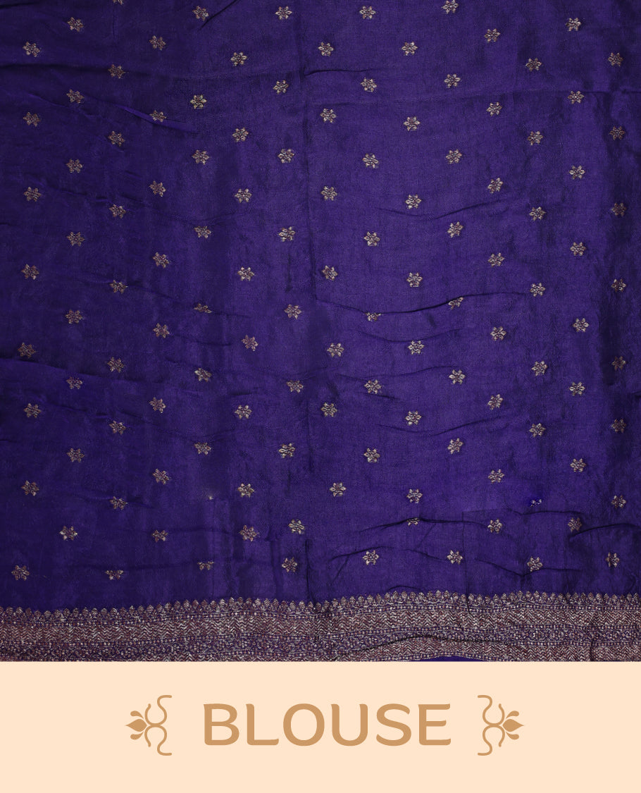 Indigo Banarasi Bandhani saree with golden zari motifs in checkered Bandhani body, detailed zari woven border, and rich pallu with tassels. A perfect blend of tradition and festive grace.