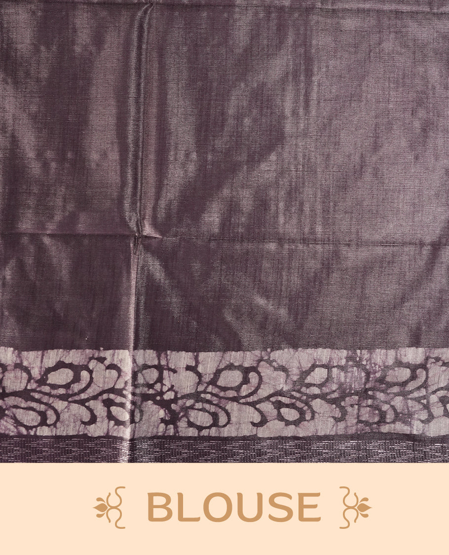 Chocolate colour semi jute tissue saree featuring intricate wave motifs all over the body, enhanced with a shimmering zari striped pallu, woven border, and matching blouse piece.