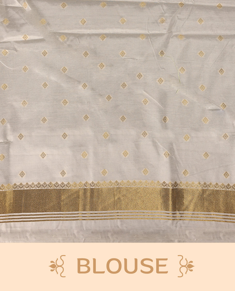 Elegant Kerala Kasavu saree with golden polka motifs and a detailed paisley woven pallu, Finished with tassels, its perfect for festive or traditional wear, Pair with a gold blouse for a classic look.