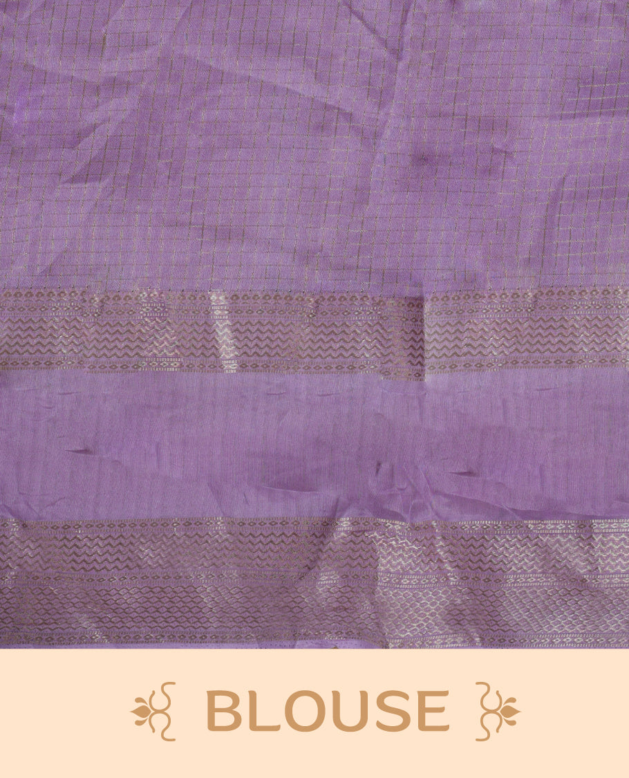 Royal purple colour saree featuring fine check patterns on the body, paired with a lavender zari woven border and pallu. Comes with a matching blouse piece
