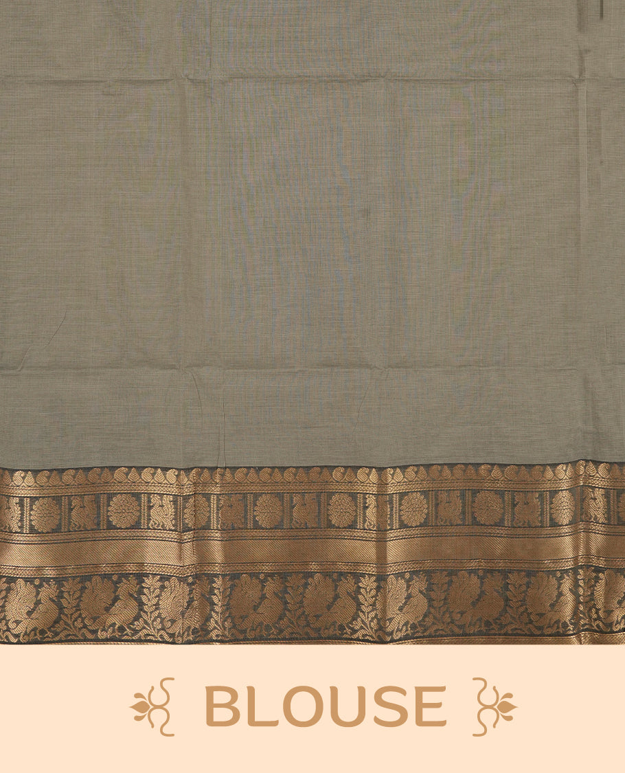 Grey colour Chettinad cotton saree adorned with subtle golden zari lines on the body, The rich ash colour border features intricate peacock and floral motifs in golden zari & Comes with a matching blouse piece.