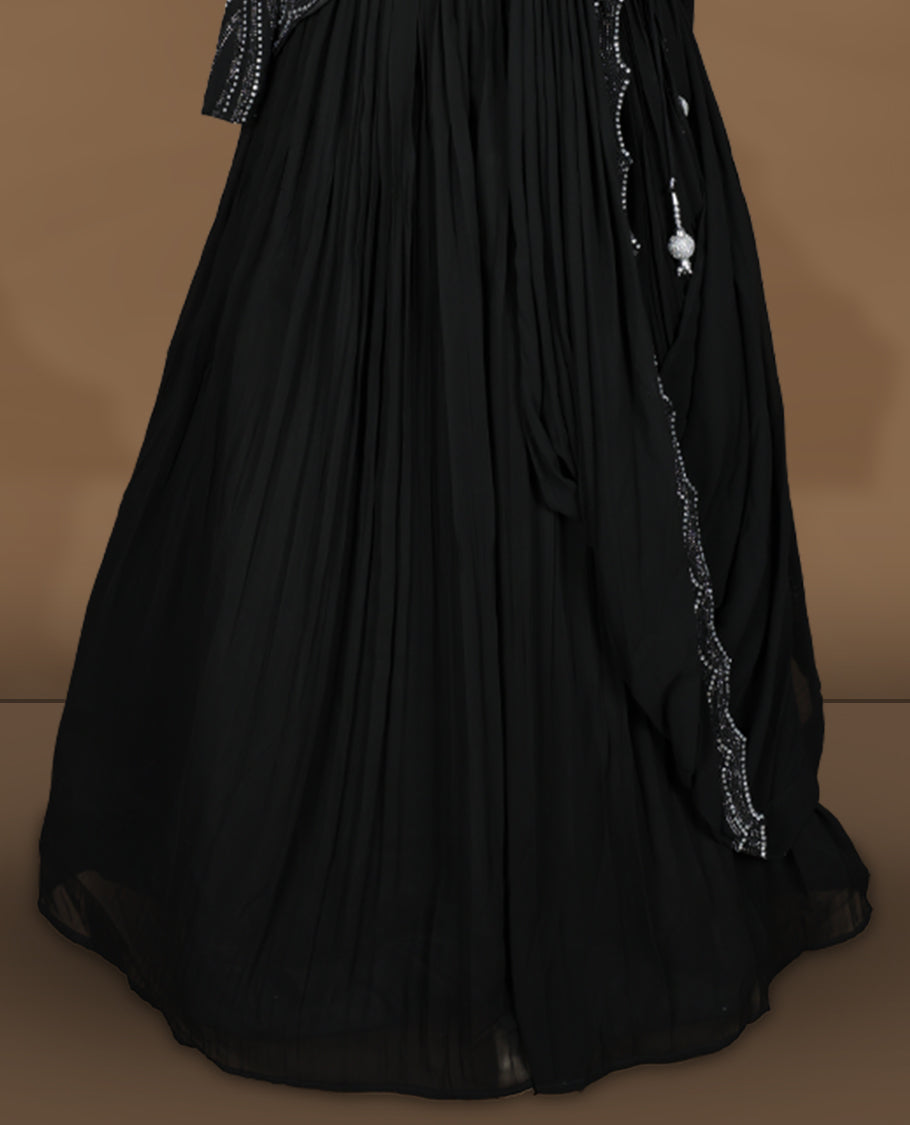 Black colour stitched gown set with sleeveless square‑neck bodice, attached pleated flare, and one‑side draped dupatta highlighted with heavy silver sequin and mirror work borders.