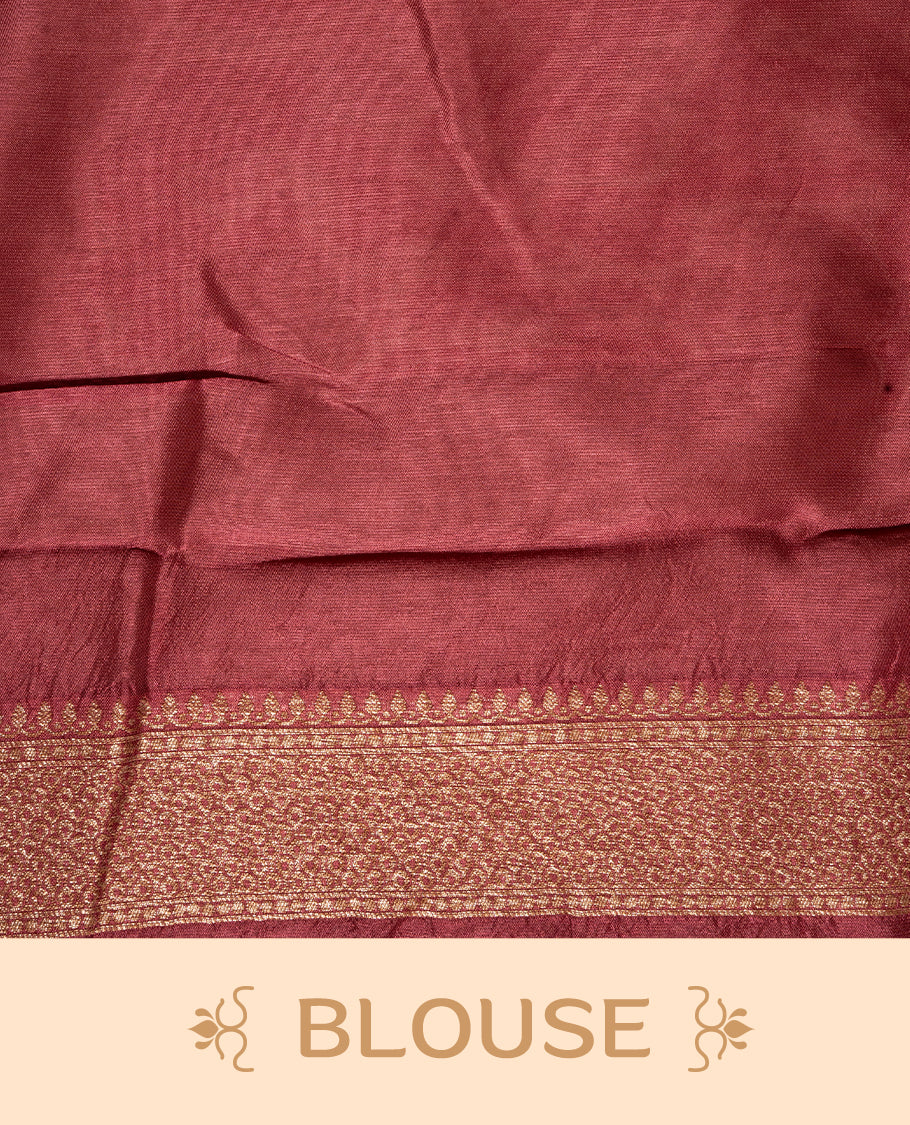 Burnt Umber colour Semi Banaras Tussar Georgette Featuring Gold zari Leaf pattern on body, Finished with Gold zari border and paired with matching blouse piece.