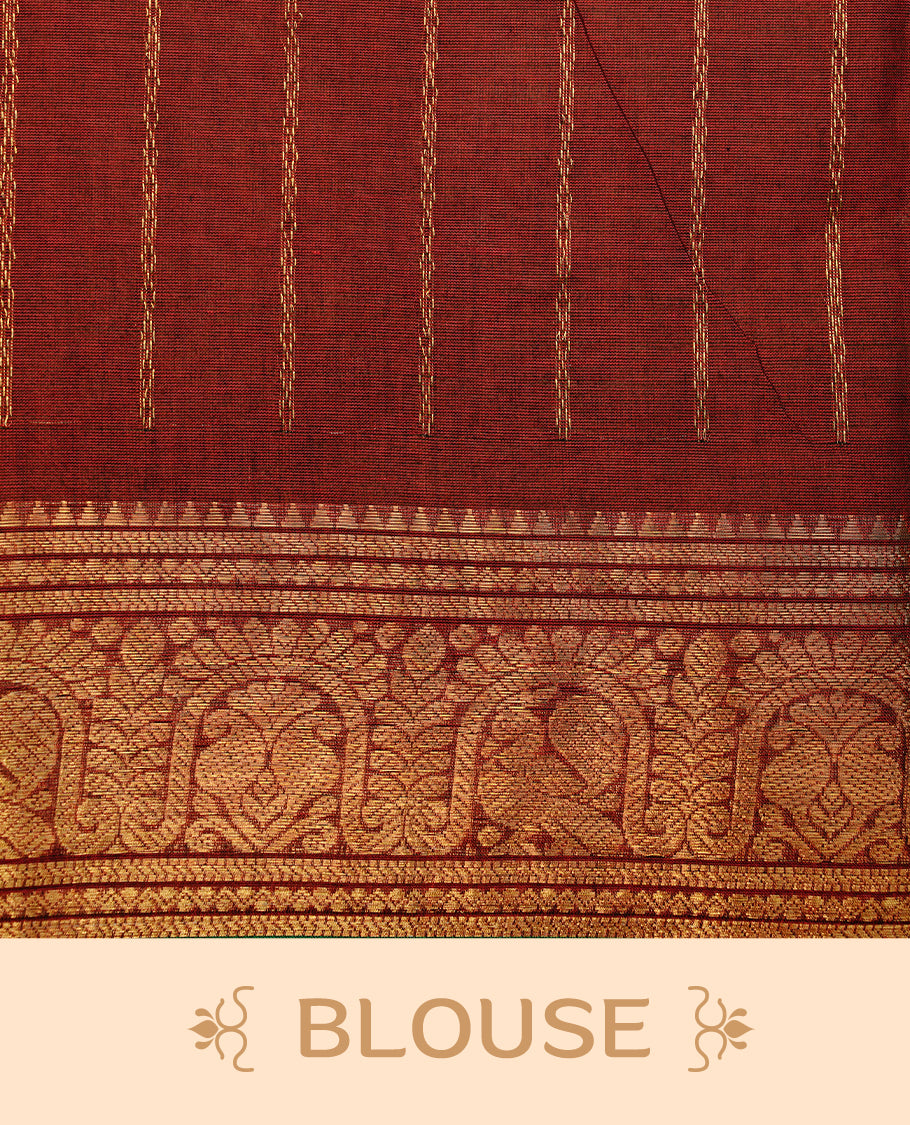 Maroon colour chettinad cotton saree featuring gold zari stripes on body, complemented by  self colour with zari green colour piping border, paired with matching blouse piece.