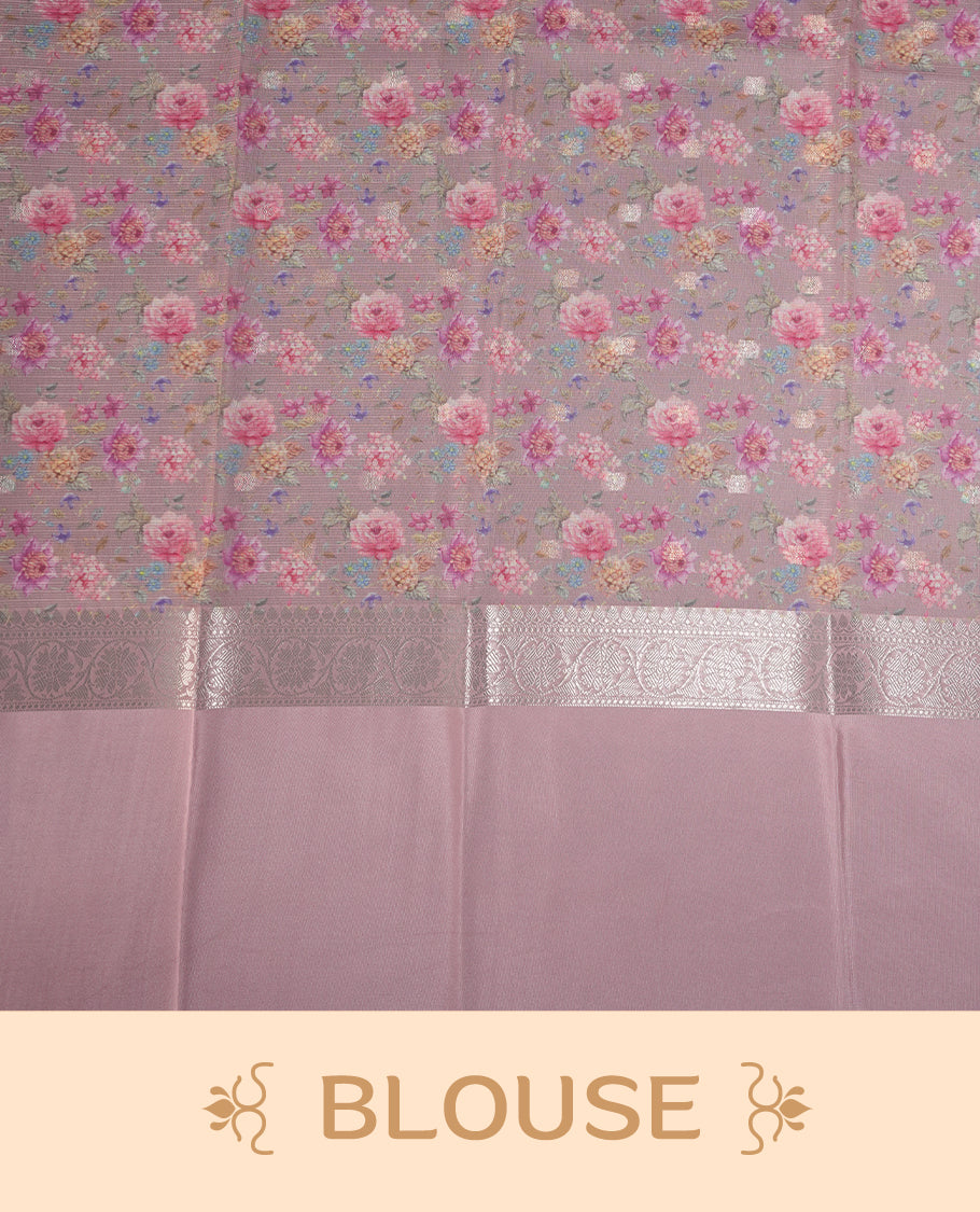 Ivory colour Kotta Tussar Silk saree features a vibrant digital floral print with small gold zari motifs on the body, and elegant pink colour banarasi border & Paired with a matching blouse,blending modern design with traditional elegance.
