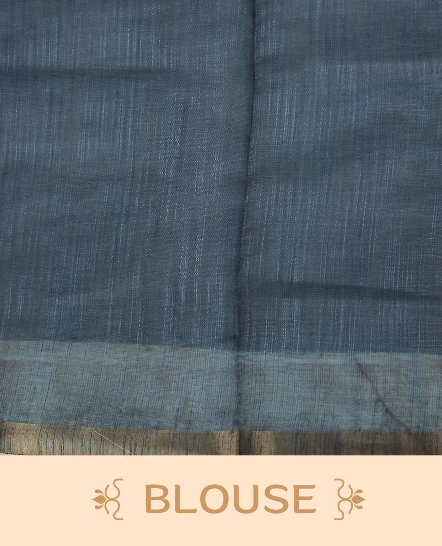 Off-white linen saree featuring beautiful Blue floral and leafy prints on the body, complemented by a tissue piping border and a contrasting pallu. Paired with a matching blouse piece.
