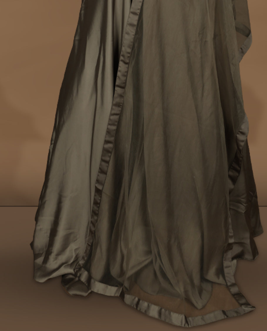 Olive brown colour lehenga set with stitched sleeveless embroidered blouse, matching stitched flared lehenga, and plain sheer dupatta with satin border.