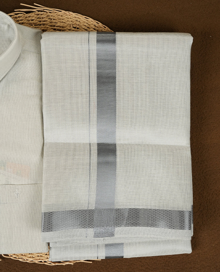 Blue Silver Colour shirt by RAMRAJ paired with a matching dhoti, all elegantly finished with a Blue silver border.