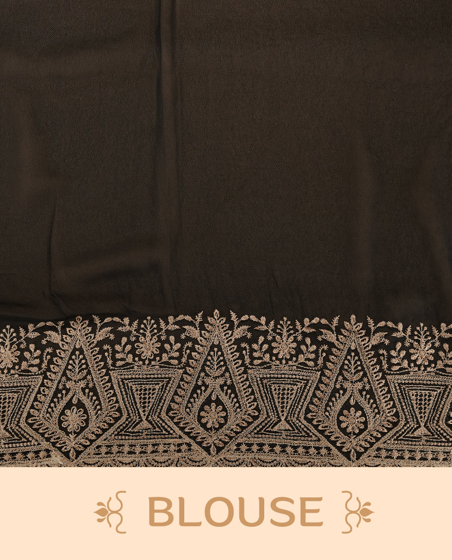 Black colour georgette designer saree featuring Gold thread floral pattern on body highlighting with stone and scalp border, paired with matching blouse piece.