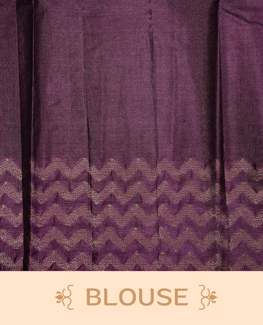 Pastel purple Colour Tussar silk saree featuring Antique Zari motifs on body, Finished with contrast Purple colour Zigzag zari pattern border, paired with matching blouse piece.