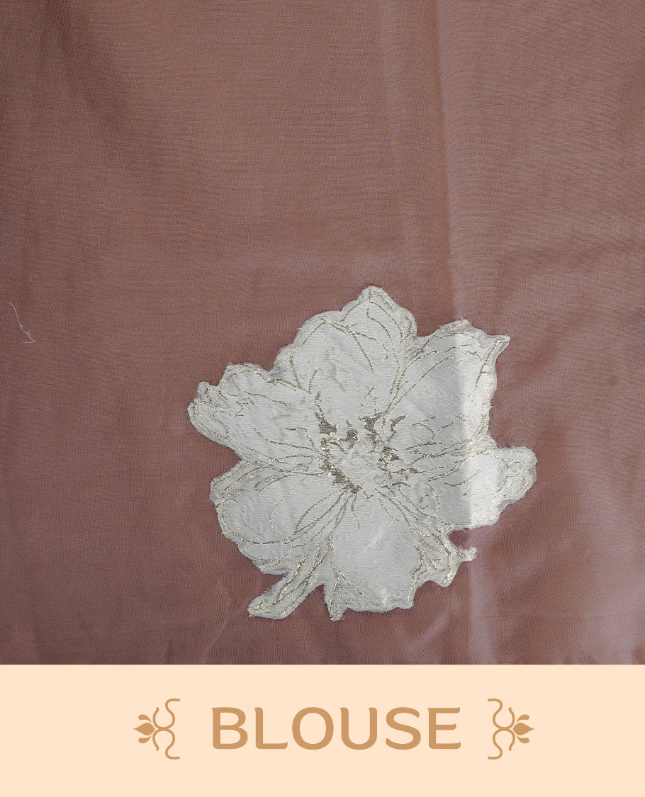 Pastel Mauve colour semi organza saree featuring white floral & gold thread pattern, highlighting scalp design border, paired with matching blouse piece.
