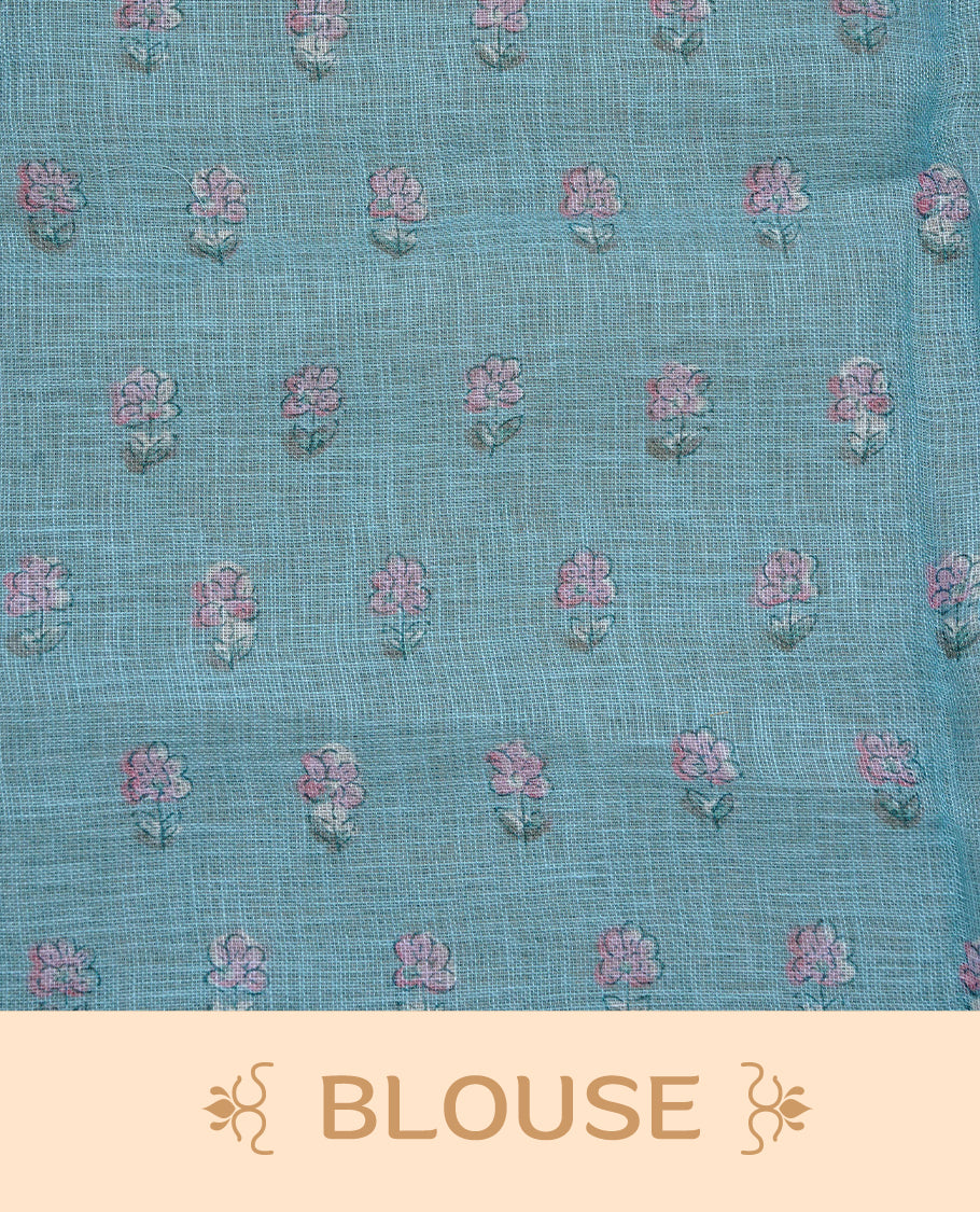 Cream colour semi linen saree featuring Floral printed buttas on body, complemented by contrast Blue colour border, comes with matching blouse piece.