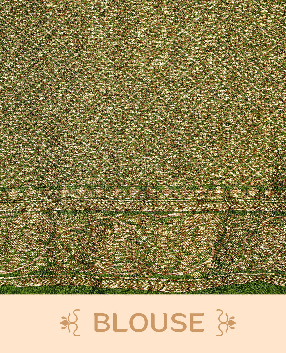 Green colour Banarasi Bandhani silk saree featuring intricate antique zari circle Buttas across the body, complemented by an elegant antique zari border. Comes paired with a matching blouse piece