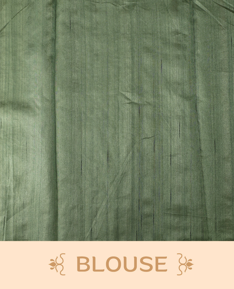 Green colour semi tussar saree adorned with elegant white applique work in leaf and floral designs across the body and border, paired with a matching blouse.