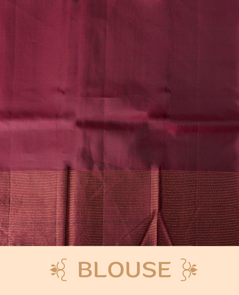 Green colour soft silk saree adorned with minimal golden motifs, paired with a contrasting maroon border and pallu featuring elegant zari patterns & Comes with a matching blouse.