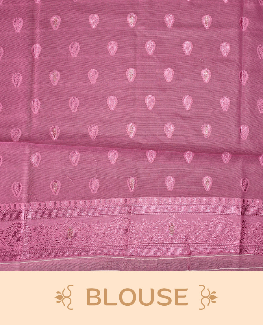 White colour saree adorned with delicate self woven motifs across the body, highlighted with a striking Pink woven border and pallu, finished with tassels, and paired with a matching blouse
