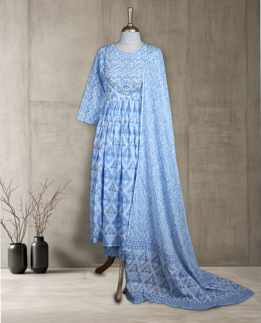 Pastel blue & white colour salwar from TWARA, featuring a delicate silver work on neck, all over floral prints on the top, paired with a matching bottom and an elegant dupatta.