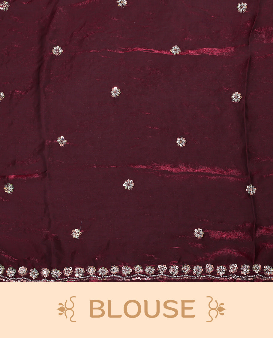 Maroon colour designer saree featuring Sequins & cut beats worked body, cut beat worked border, paired with matching unstitched blouse.