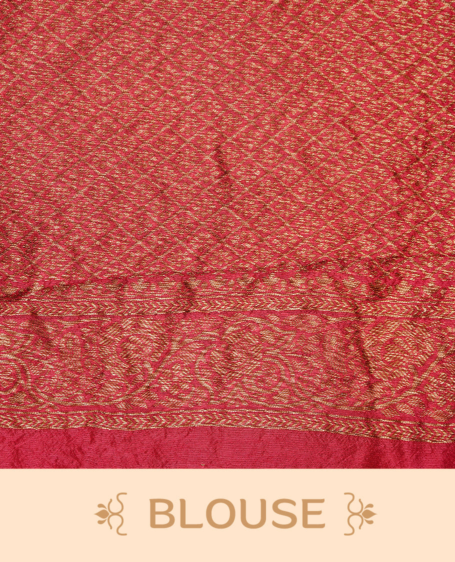 Red colour Banarasi Bandhani silk saree featuring intricate antique zari circle Buttas across the body, complemented by an elegant antique zari border. Comes paired with a matching blouse piece