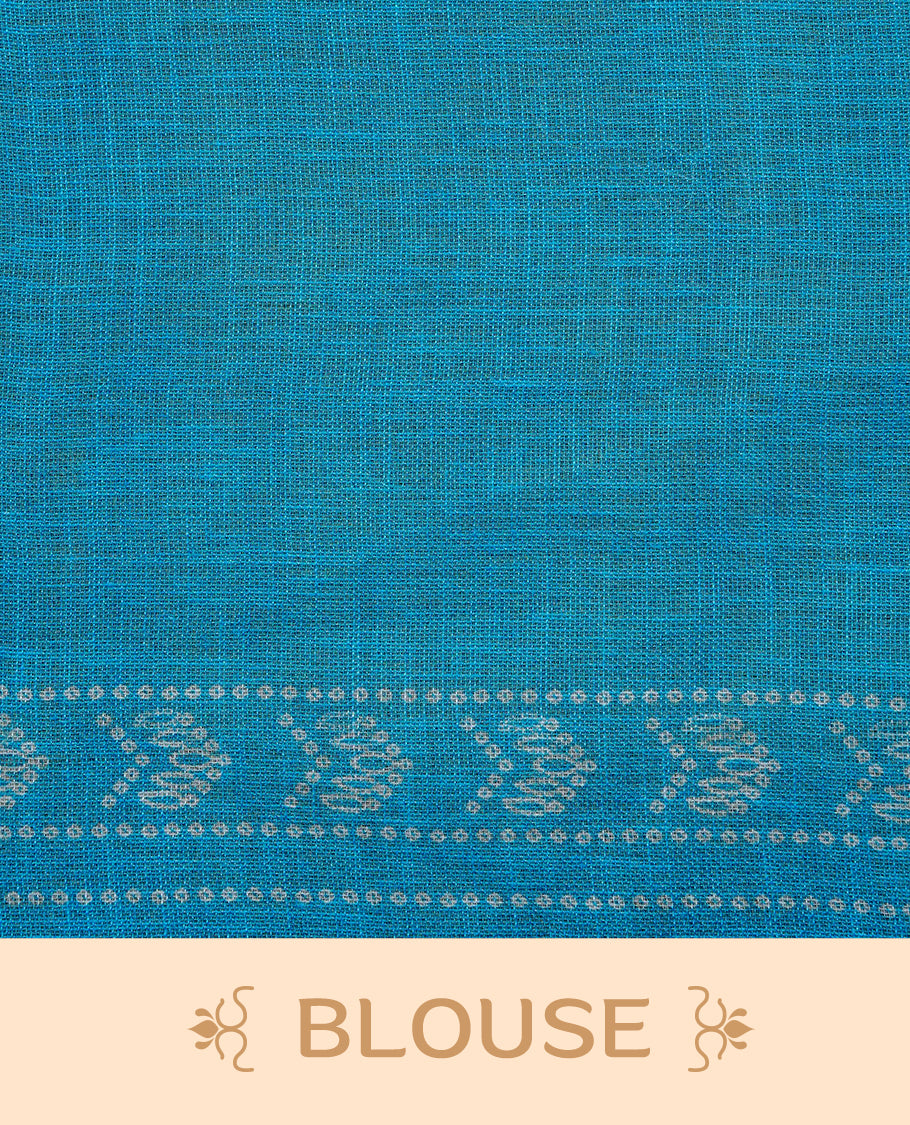 Cream colour semi linen saree featuring Green Ajrakh pattern print on body, complemented by contrast Blue colour with same pattern print border, comes with matching blouse piece.